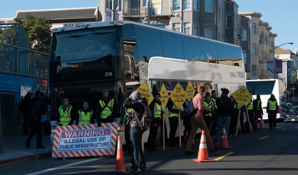 Protesters block a Google bus in San Francisco.