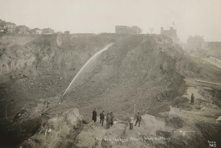 The caption at the bottom reads, "3rd Avenue looking South from Battery." Credit: Seattle Public Library Seattle Regrade Collection