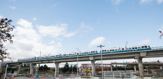 New elevated section of track near Northgate Station with light rail vehicle testing. (Sound Transit)