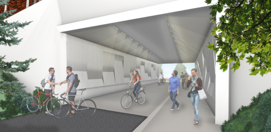 A rendering shows three people biking and three walking on the trail through the tunnel.