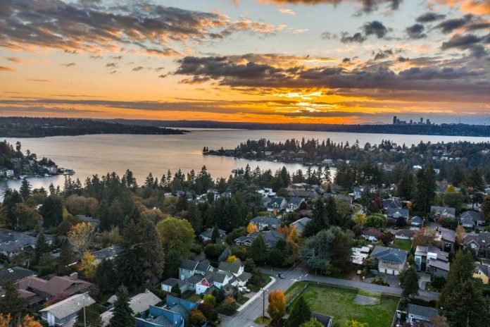 Aerial view of houses near Lake Washington at sunset.
