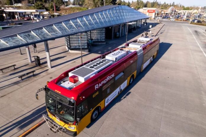 A photo of a RapidRide H bus at Burien Transit Center