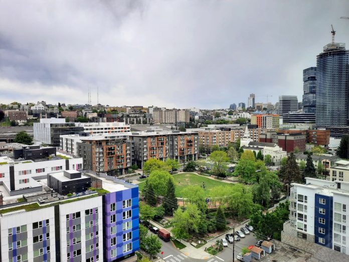 A view of the eastern half of South Lake Union with Capitol Hill and First Hill apartment towers in the background.