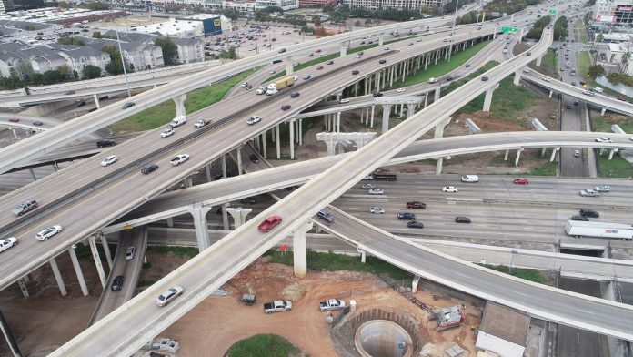 A tangle of more than a dozen flyover ramps in a I-610 interchange.