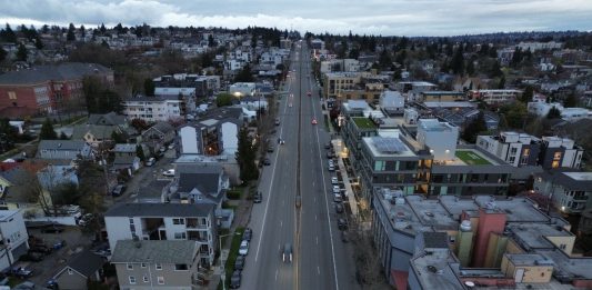 A Seattle neighborhood with apartment buildings fronting Aurora Ave N, a busy loud street