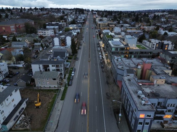 A Seattle neighborhood with apartment buildings fronting Aurora Ave N, a busy loud street