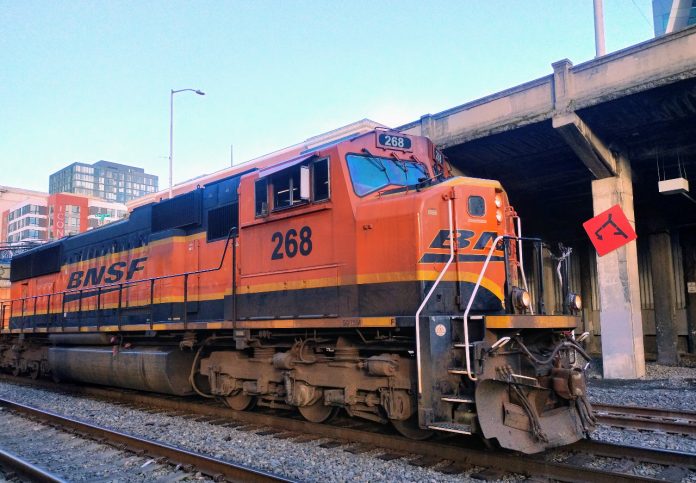 A BNSF train comes through King Street Station