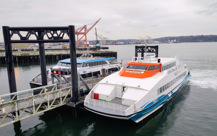 A King County water taxi and a Kitsap Fast Ferry at Pier 50