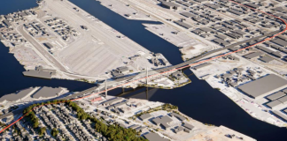 An aerial image shows the new light rail bridge over the Duwamish River to West Seattle Junction.