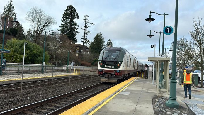 An Amtrak Cascades train pulls out of Mukilteo Station.